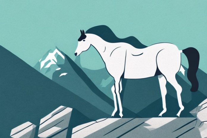 A horse standing in a rocky mountain landscape