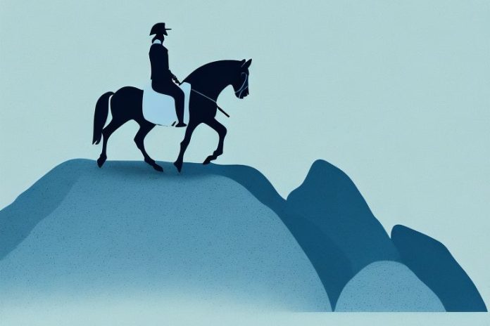 A horse and rider silhouetted against the backdrop of a rocky mountain range