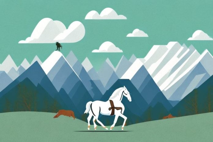 A horse and rider in the rocky mountains