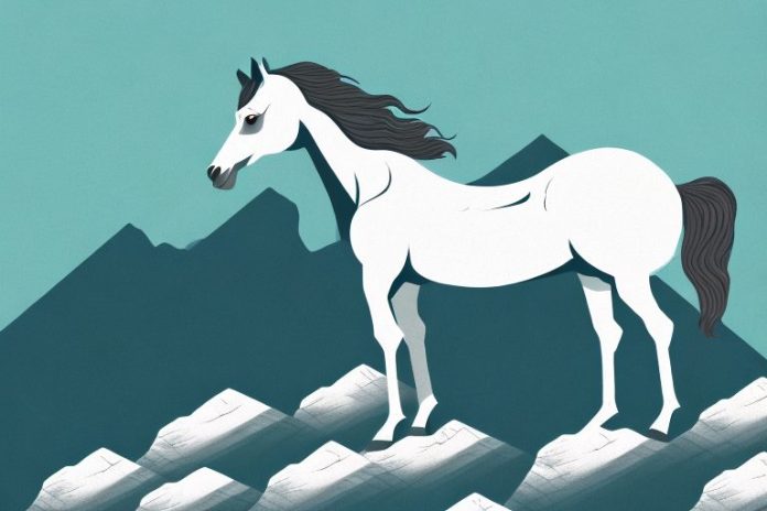 A majestic horse standing atop a rocky mountain in musina