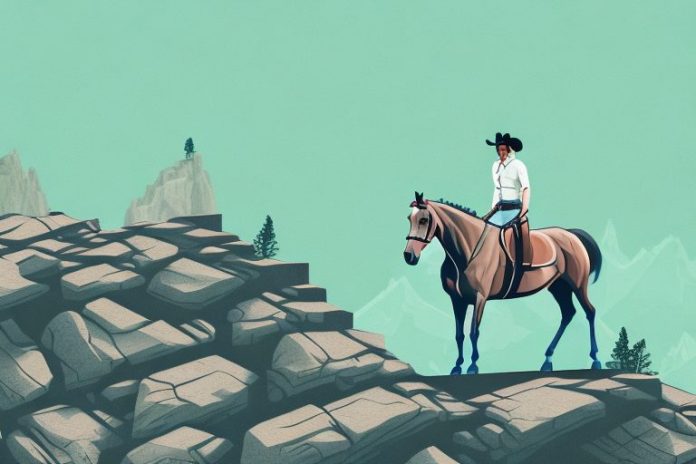 A horse rider atop a rocky mountain in the kuruman landscape