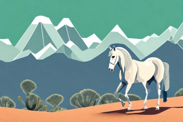 An andalusian horse in a desert landscape
